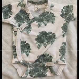 Kate Quinn short sleeve wrap body suit